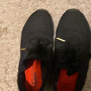 New Balance Leopard and black sneakers